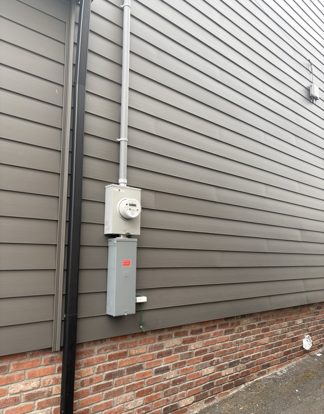 Exterior electrical meter and main service disconnect